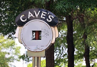 The Cave's clock Wednesday May 24, 2023, at the corner of Capitol and Main streets in Little Rock. (Arkansas Democrat-Gazette/Staton Breidenthal).